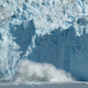 Ice breaking off from the 656-foot-tall (200-meter) face of the Eqip Sermia Glacier.